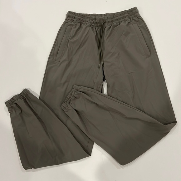 TNA Pants - ARITZIA TNA nylon green joggers size XS